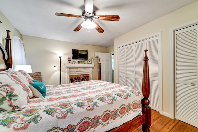 1504 Red Marble Rd, Andrews, NC 28901 - bedroom with multiple closets, wood finished floors, and ceiling fan
