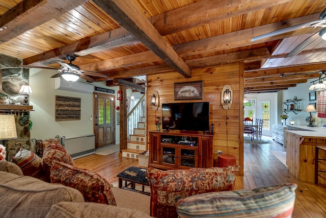 1504 Red Marble Rd, Andrews, NC 28901 - living room with ceiling fan, hardwood / wood-style floors, a wood ceiling with exposed beams, wood walls, and a wall mounted AC