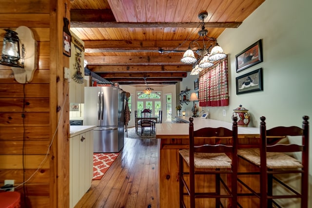 1504 Red Marble Rd, Andrews, NC 28901 - dining room with a wood ceiling with exposed beams, dark wood-style floors, and a chandelier