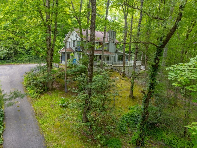 1504 Red Marble Rd, Andrews, NC 28901 - view of side of home with asphalt driveway and a wooded view