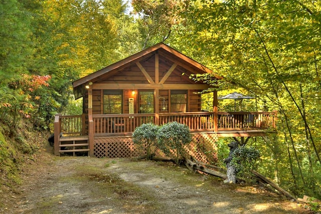 view of front of house with a deck