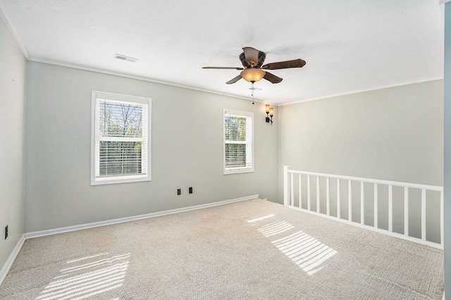 542 Sharp Top Cir, Blairsville, GA 30512 - unfurnished room featuring crown molding, ceiling fan, carpet, baseboards, and visible vents
