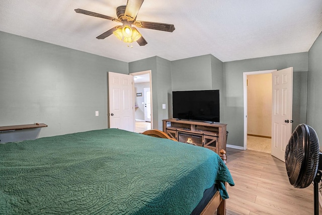 542 Sharp Top Cir, Blairsville, GA 30512 - bedroom featuring light wood-type flooring, baseboards, and ceiling fan