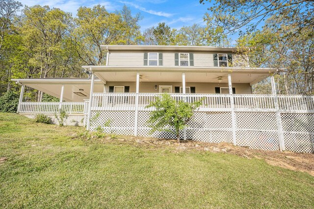 542 Sharp Top Cir, Blairsville, GA 30512 - back of property featuring a porch, a ceiling fan, and a yard