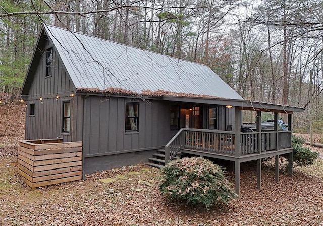 rear view of house with a deck