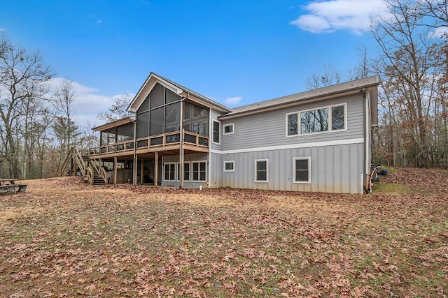 back of property featuring a sunroom