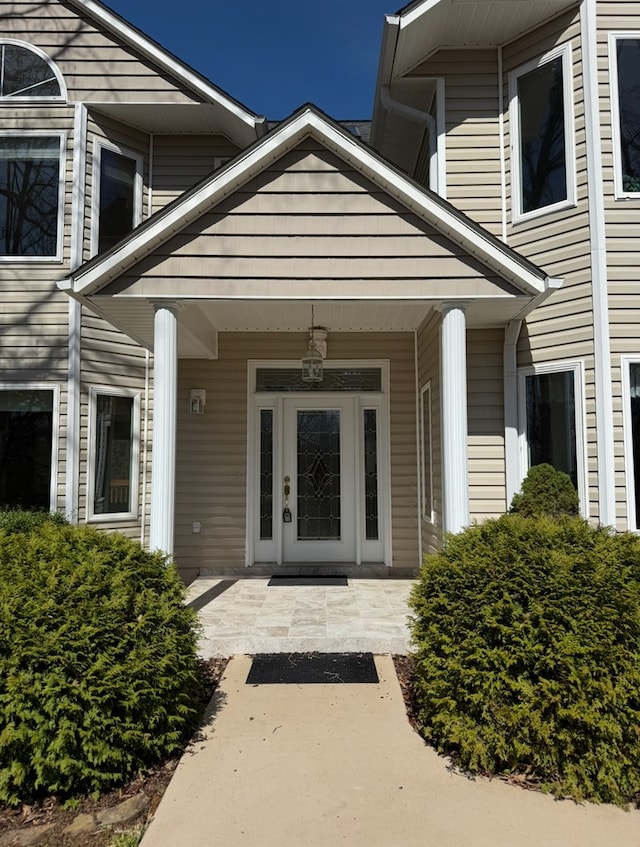 doorway to property with a porch