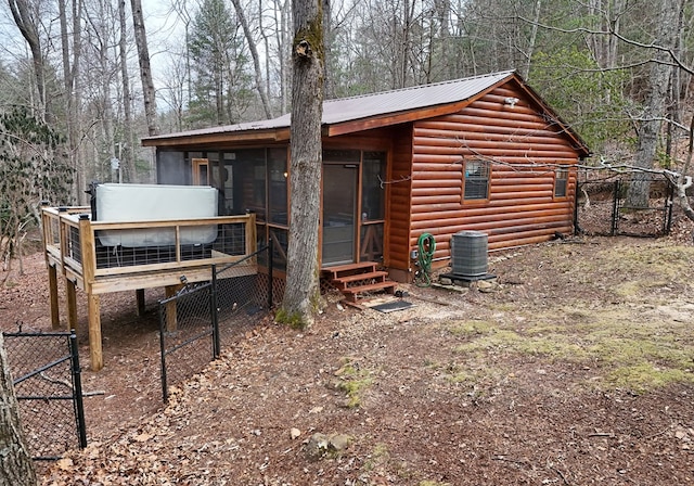 view of outbuilding featuring cooling unit