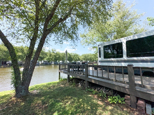 dock area with a water view