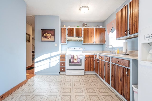 kitchen with sink, a textured ceiling, and white electric range