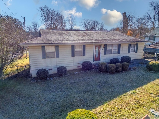 single story home featuring a front yard