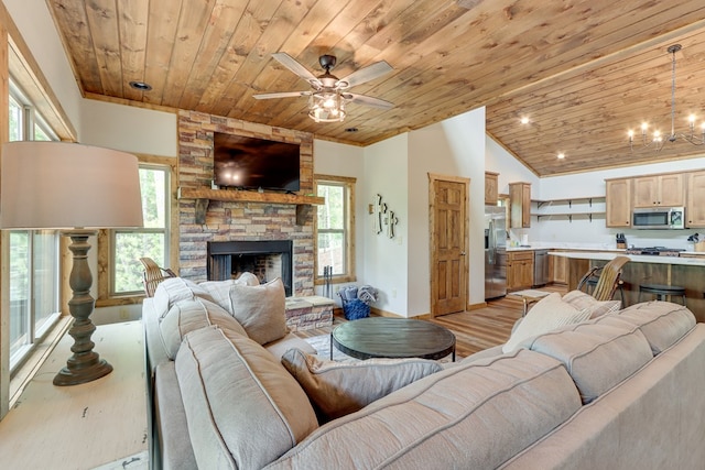 living room featuring a stone fireplace, wooden ceiling, baseboards, vaulted ceiling, and light wood-style floors