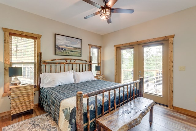 bedroom featuring access to outside, ceiling fan, baseboards, and wood finished floors