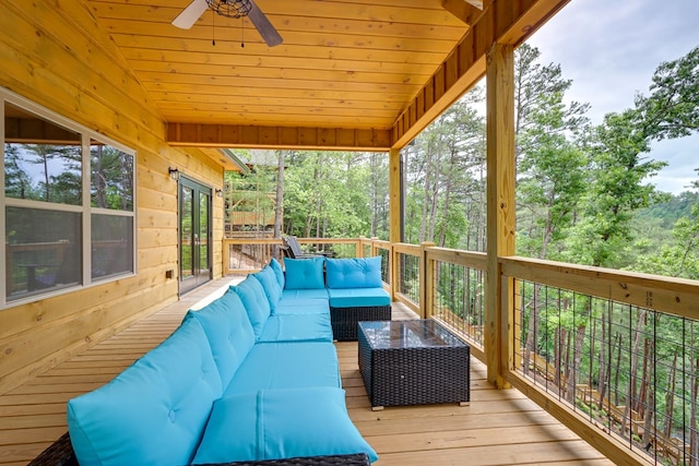 deck with an outdoor hangout area, ceiling fan, and french doors