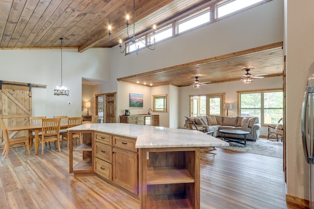 kitchen with open shelves, wood ceiling, and light wood-style floors