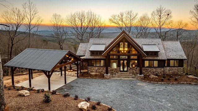 view of front facade featuring stone siding