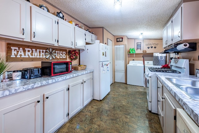 kitchen featuring white appliances, white cabinets, sink, a textured ceiling, and washer / clothes dryer