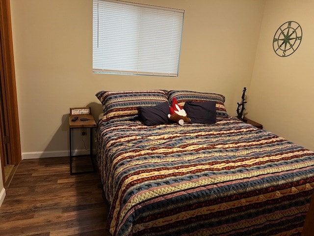 bedroom featuring dark hardwood / wood-style floors