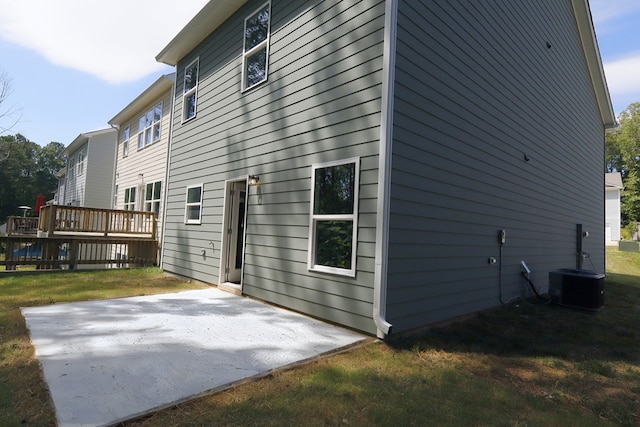 65 Hood Park Ct, Jasper, GA 30143 - rear view of property featuring a patio, a deck, central AC, and a lawn