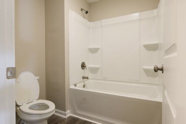 65 Hood Park Ct, Jasper, GA 30143 - bathroom featuring washtub / shower combination, wood finished floors, toilet, and baseboards