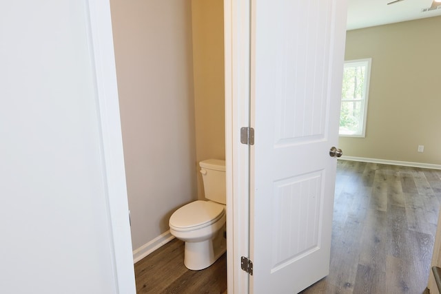 65 Hood Park Ct, Jasper, GA 30143 - bathroom featuring toilet, wood finished floors, and baseboards