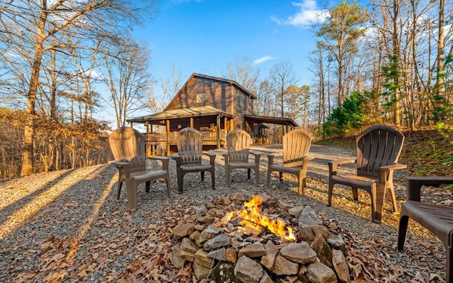 exterior space featuring a fire pit