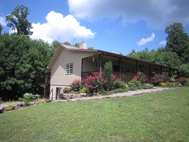 exterior space with a yard