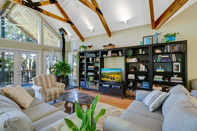 14 Rivendell Dr, Hayesville, NC 28904 - living room with wood finished floors, beamed ceiling, high vaulted ceiling, and french doors