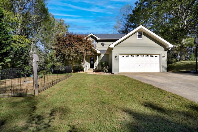 view of front of property featuring a front lawn and a garage