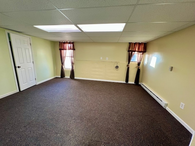 75 Briar Patch Dr, Covington, GA 30014 - spare room with a wealth of natural light, a drop ceiling, and a baseboard heating unit