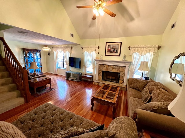 75 Briar Patch Dr, Covington, GA 30014 - living room with a fireplace, ceiling fan, hardwood / wood-style floors, and high vaulted ceiling