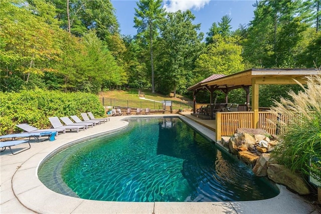 view of pool featuring a gazebo and a patio area