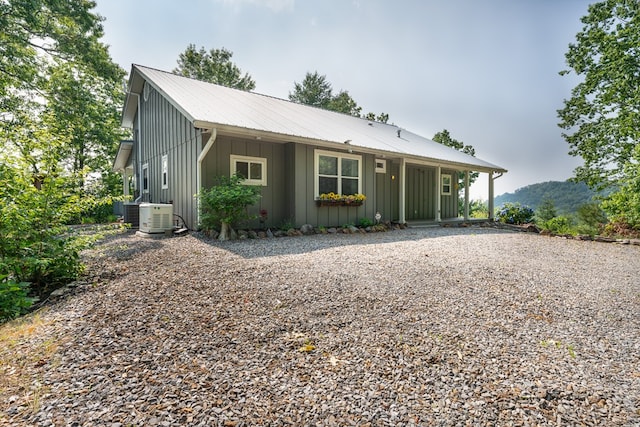 330 Ravens Gap Rd, Murphy, NC 28906 - view of front facade with board and batten siding, a metal roof, and a porch