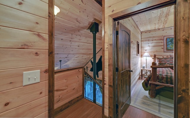 detailed view of wooden walls, wood finished floors, and wooden ceiling