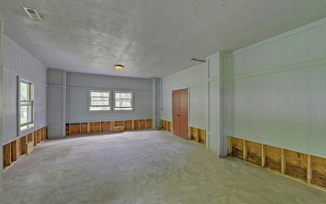 unfurnished room with plenty of natural light