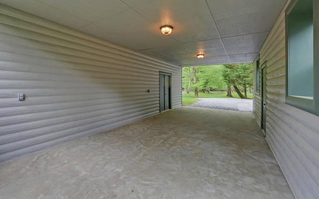 view of patio featuring an attached carport