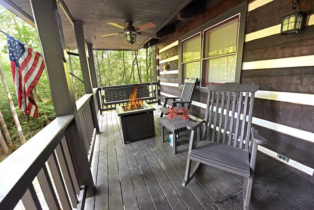 wooden terrace with ceiling fan