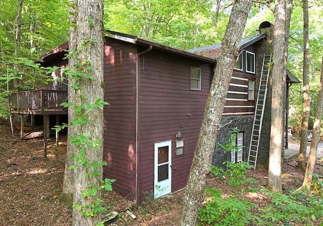 view of home's exterior featuring a deck