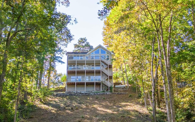 rear view of house with a balcony