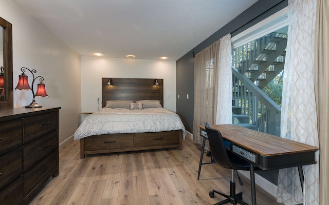 bedroom with light wood-type flooring