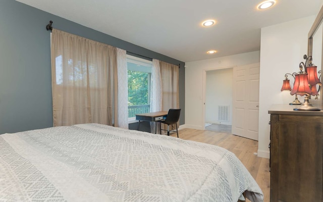 bedroom featuring light wood-type flooring