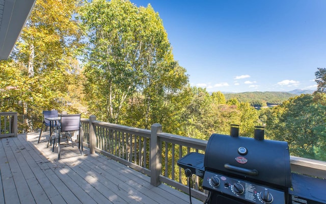 deck featuring a grill