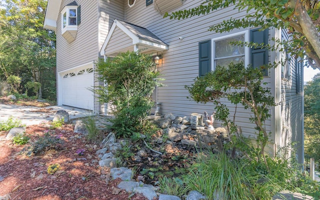 view of home's exterior with a garage