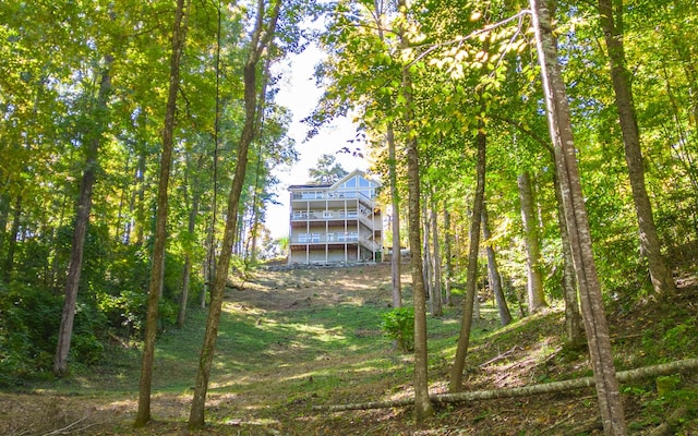 view of yard featuring a wooden deck