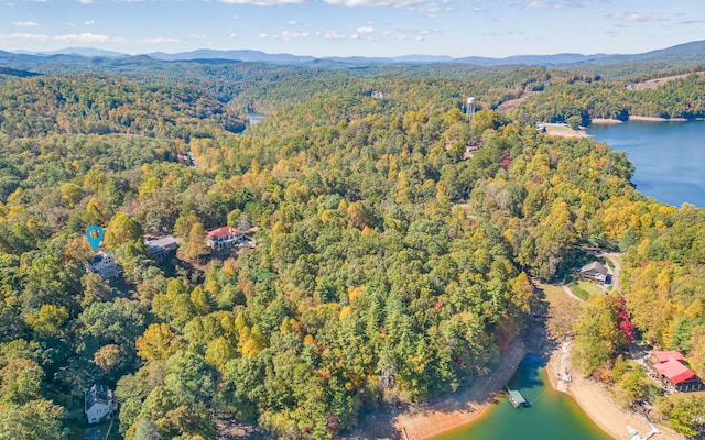 aerial view featuring a water and mountain view