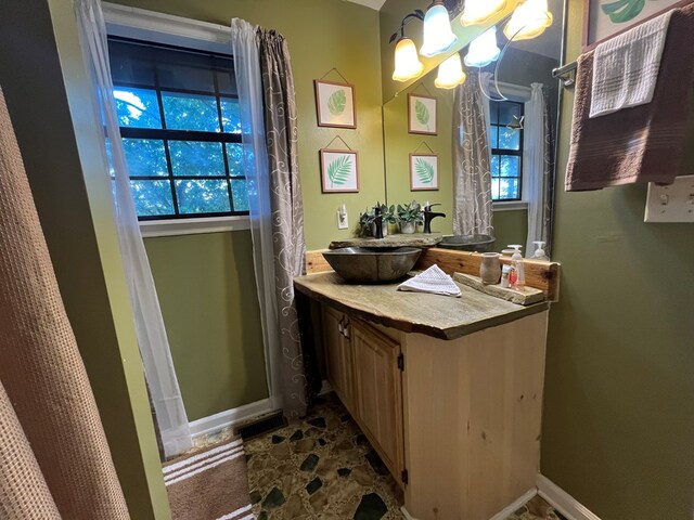 bathroom featuring vanity and plenty of natural light