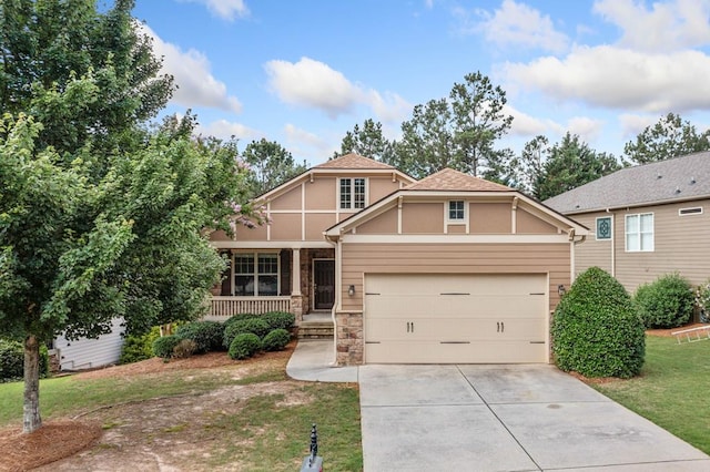 238 Balsam Dr, Canton, GA 30114 - view of front of house with concrete driveway, covered porch, a front lawn, stone siding, and a garage
