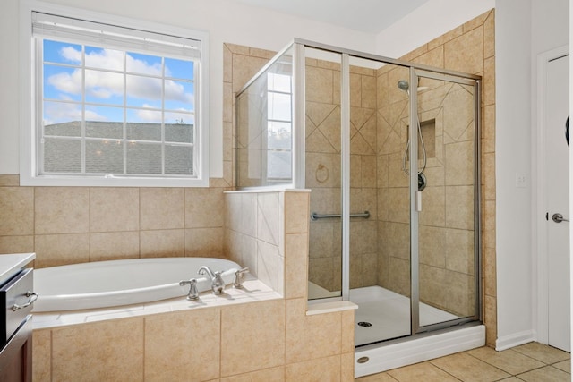 238 Balsam Dr, Canton, GA 30114 - full bathroom featuring a garden tub, a shower stall, vanity, and tile patterned floors