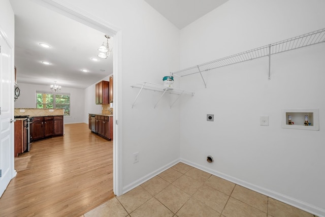 238 Balsam Dr, Canton, GA 30114 - laundry room featuring electric dryer hookup, washer hookup, a chandelier, light wood-type flooring, and recessed lighting