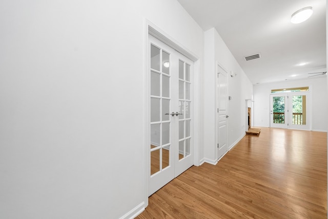 238 Balsam Dr, Canton, GA 30114 - hallway with french doors and wood finished floors